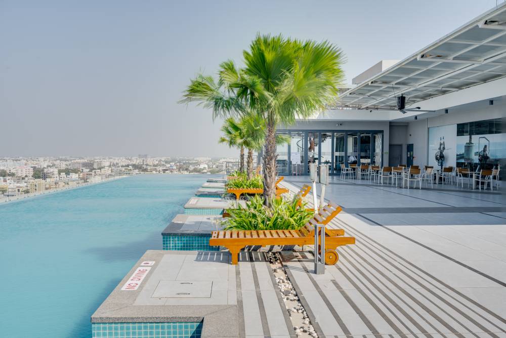 Rooftop Infinity Pool with City View
